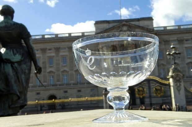The Queen's Awards crystal bowl with Buckingham Palace in the background.